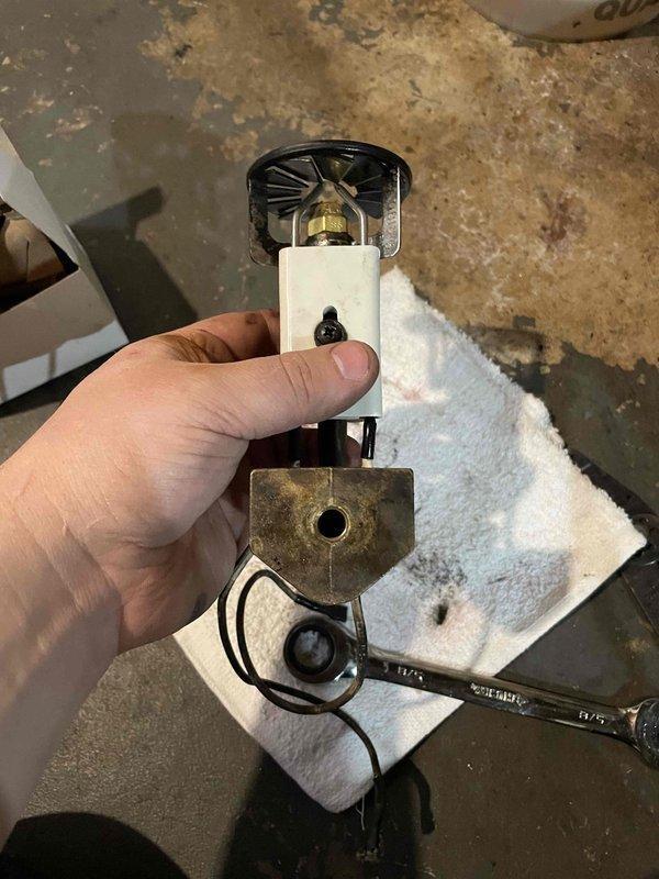 Performed scheduled maintenance service and replaced worn ignition electrodes on furnace. Removed old sooty electrodes with damaged ceramic housing and installed new OEM replacement components. System tested and verified proper ignition sequence after 4-hour service call.