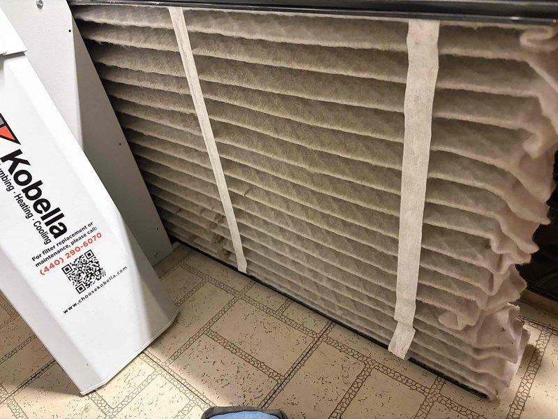 Completed heating maintenance service and renewed maintenance plan. Inspected ignition electrode component and evaluated air filter condition which showed significant dust accumulation. Replaced filter and verified proper system operation.