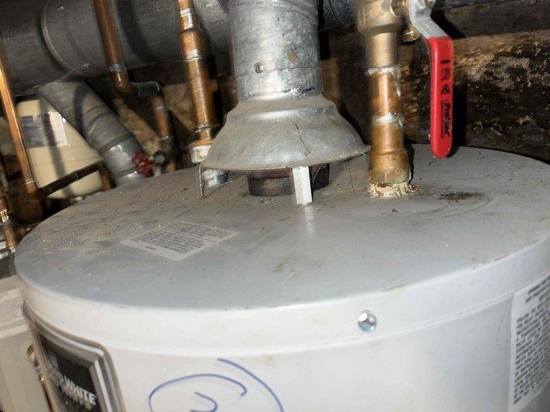 Successfully replaced failed 50-gallon gas water heater with new 40-gallon Rheem unit. Completed proper installation of all copper supply lines, shut-off valve, and galvanized steel vent pipe with appropriate connections. System tested and confirmed operational with no leaks.