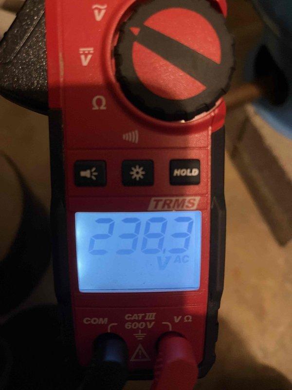 Responded to emergency no-water call and diagnosed failed well pump that was over 30 years old. Performed electrical testing with multimeter, measuring 238.3V AC at the contactor, and observed significant corrosion on the electrical terminals. Recommended complete replacement of the aging pump system due to extensive wear and terminal oxidation.