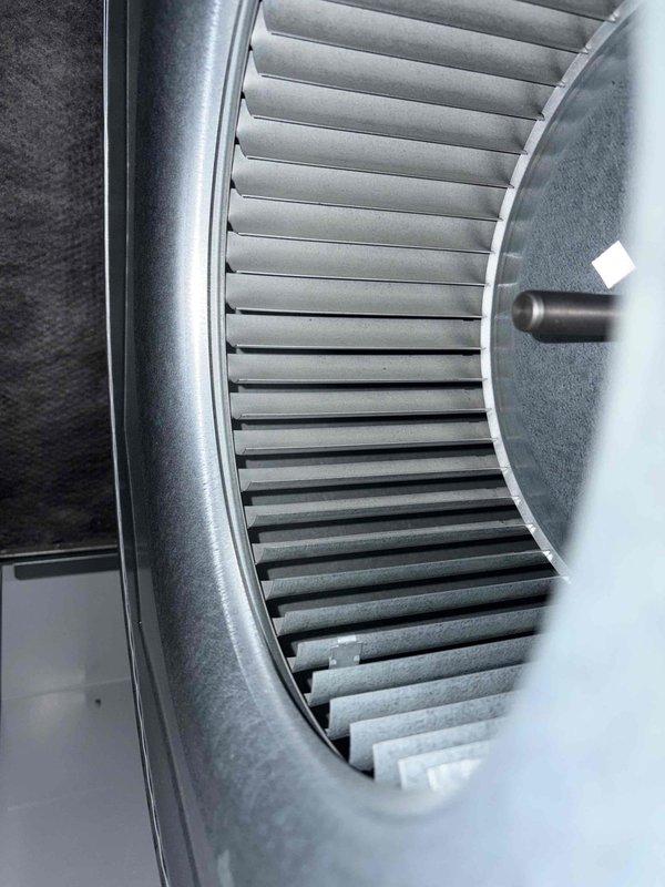 Performed heating maintenance service on air handler unit. Inspected blower wheel assembly which showed good condition with no visible dust buildup or damage. Conducted electrical diagnostics using Fieldpiece SC440 multimeter, confirming proper voltage readings at 279V. Replaced air filter as requested during the scheduled club membership maintenance visit.