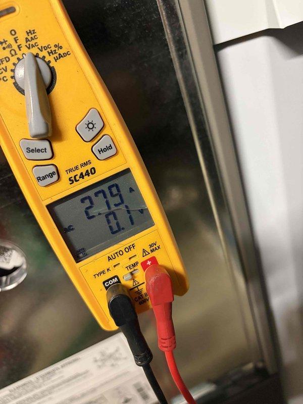 Performed heating maintenance service on air handler unit. Inspected blower wheel assembly which showed good condition with no visible dust buildup or damage. Conducted electrical diagnostics using Fieldpiece SC440 multimeter, confirming proper voltage readings at 279V. Replaced air filter as requested during the scheduled club membership maintenance visit.