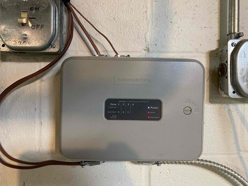 Returned to complete a combi boiler installation previously sold. Successfully installed and connected the Honeywell Home zone controller with four-zone capability to the new system, ensuring proper wiring through existing conduits. Completed copper pipe connections to integrate with the home's plumbing network and installed PVC venting according to manufacturer specifications.