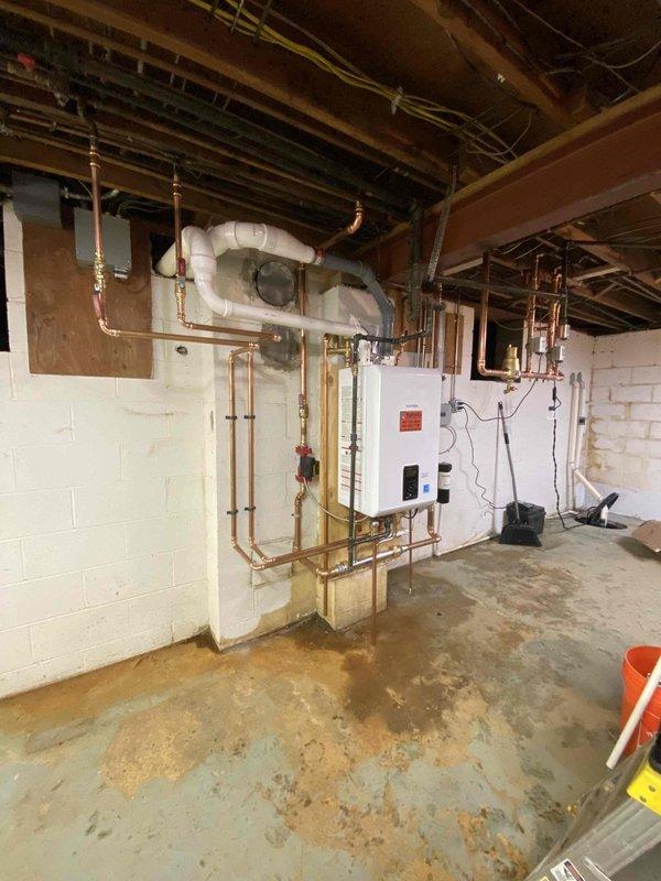 Returned to complete a combi boiler installation previously sold. Successfully installed and connected the Honeywell Home zone controller with four-zone capability to the new system, ensuring proper wiring through existing conduits. Completed copper pipe connections to integrate with the home's plumbing network and installed PVC venting according to manufacturer specifications.