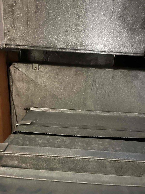 Conducted comprehensive evaluation of existing residential HVAC system located in basement, including detailed inspection of furnace components, associated ductwork, and attached humidifier unit. Documented current system condition through detailed photographs, noting potential replacement options for customer consideration based on lead referral.