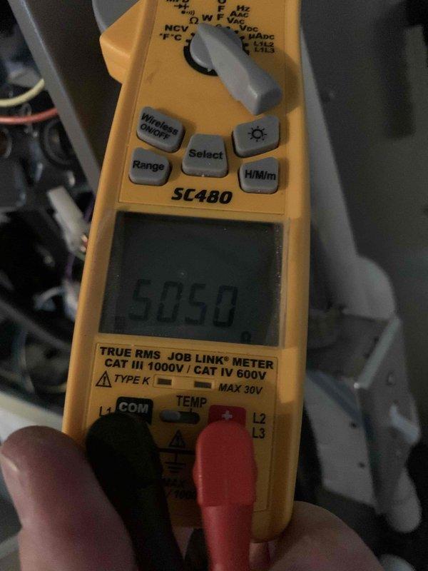 Performed routine heating maintenance on member's newly installed air handler system. Conducted electrical diagnostics with clamp meter, verifying system is operating at 50.50 amps. Examined and cleaned dust accumulation from internal components to ensure optimal system performance.