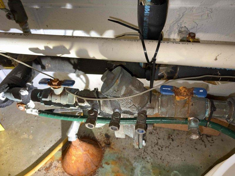 Conducted site visit to assess replacement needs for multiple faucets (one in kitchen, two in women's restroom, and one in solo restroom). Documented existing plumbing fixtures with photographs, noting significant oxidation and rust on current valve assemblies and connections. Prepared estimate for basic replacement fixtures as requested by client.