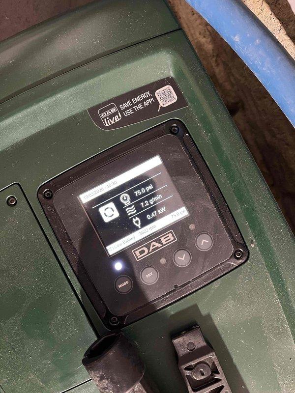 Inspected DAB sump pump system in basement showing 2.3 m³/h flow rate and 0.47 kW power consumption. Determined electrical outlet installation is required before proper diagnostics can be performed. Will return after electrician completes outlet installation to conduct manufacturer-assisted troubleshooting via phone.