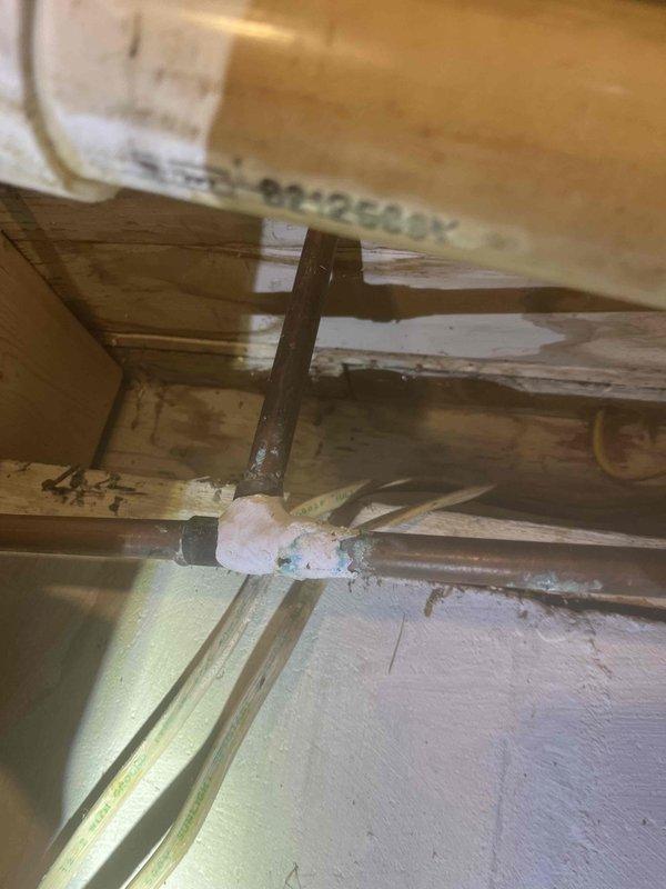 Replaced faulty shut-off valve on bathroom sink and installed new copper supply line in basement. Removed significant debris blockage from garage drain line using snake, ensuring proper drainage function. All plumbing repairs were completed to code requirements in preparation for home sale.