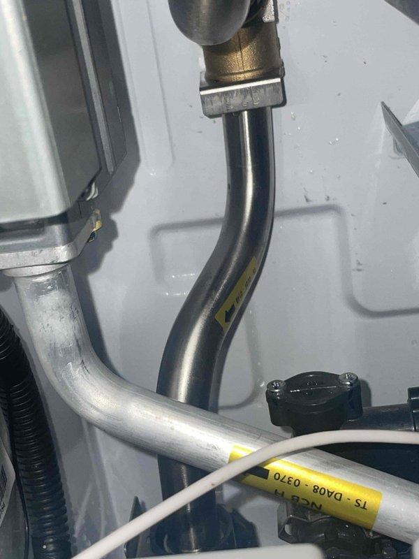 Returned to complete warranty repair, installing previously sold replacement part for Navien condensing heat exchanger system. Successfully completed installation of new component, including proper connection of stainless steel and copper piping to the unit's fittings and verification of system operation via control panel diagnostics. Total labor time: 2 hours.