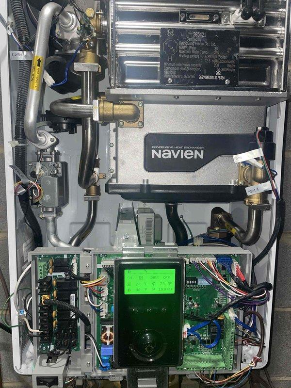 Returned to complete warranty repair, installing previously sold replacement part for Navien condensing heat exchanger system. Successfully completed installation of new component, including proper connection of stainless steel and copper piping to the unit's fittings and verification of system operation via control panel diagnostics. Total labor time: 2 hours.