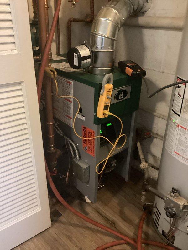 Returned to complete scheduled boiler maintenance under warranty coverage. Successfully replaced defective pump and verified proper system operation with combustion analysis. Burner assembly functioning correctly with normal flame pattern observed during final inspection.