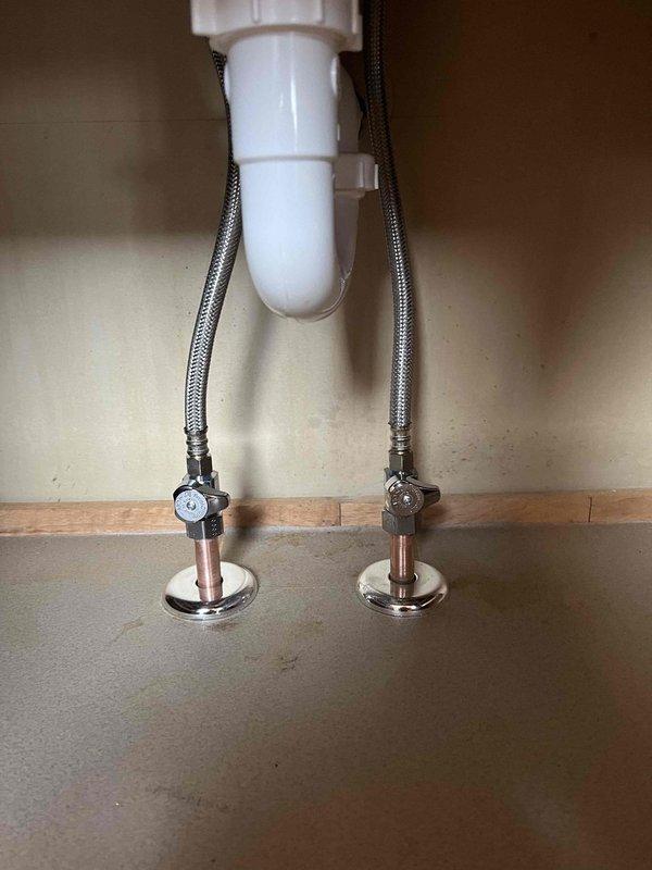 Successfully replaced pressure tank with appropriate T-fittings and installed eight new 1/4 turn shut-off valves throughout the system. Additionally installed customer-supplied faucet and drop-in sink, ensuring proper connection with new P-trap assembly and verified leak-free operation of all components.