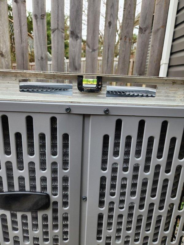 # HVAC Install - Complete System

## Job Description

Completed full HVAC system installation following approved project specifications. Installed new 3-ton air conditioning condenser unit (Model A5AC30036A1000AA) in exterior location with proper positioning and leveling verified by precision instruments. Unit was manufactured January 2023 and operates at 208-230 volts meeting all electrical specifications and safety requirements. Equipment was properly secured, labeled with all required technical specification and warning decals clearly visible, and positioned adjacent to building structure with adequate clearance from privacy fencing for optimal airflow and future maintenance access. All installation work performed in accordance with manufacturer guidelines and industry standards, with system ready for startup and commissioning.