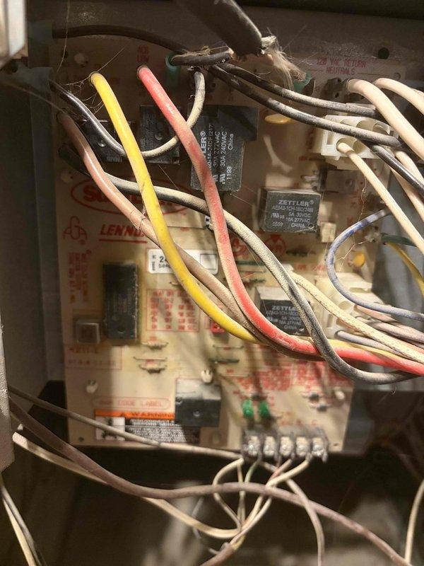 # Service Report: No Heat Call - Gas Furnace

Responded to a no heat service call for a Lennox gas furnace. Customer reported the heater was turning off intermittently, though the system was still capable of producing heat when operational. Upon arrival, performed complete system diagnostics to identify the root cause of the cycling issue.

Conducted visual inspection of the furnace cabinet and internal components. Examined the blower assembly and found moderate dust accumulation on the squirrel cage blower wheel, which can restrict airflow and cause premature limit switch cycling. Inspected the control board, a Lennox OEM board with multiple relay connections including a Zettler relay module, and verified all wire connections were secure with no signs of arcing or heat damage.

Tested system operation through multiple heating cycles to replicate the reported issue. Monitored temperature rise, flame sensor operation, and limit switch behavior. Verified proper voltage at all control ter