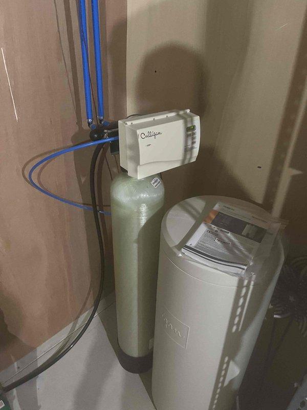 Responded to service call for leaking 75-gallon gas power-vented water heater. Upon inspection, confirmed active leak from tank requiring immediate replacement. Drained existing unit and removed from service. Installed new tankless gas water heater system with proper venting, including PVC exhaust piping and intake air supply. Connected copper supply lines with shutoff valves, verified all gas connections for safety, and tested unit operation. System commissioned and confirmed proper hot water delivery throughout property.