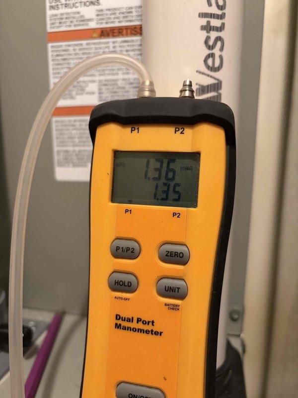 Completed heating maintenance on two systems for club member. Inspected evaporator coils and found significant accumulation of dust and debris coating the fins, restricting airflow and reducing system efficiency. Measured static pressure readings using digital manometer, which indicated 136 PSIG and 135 PSIG across the system. Documented conditions with photos for service records and member reference.