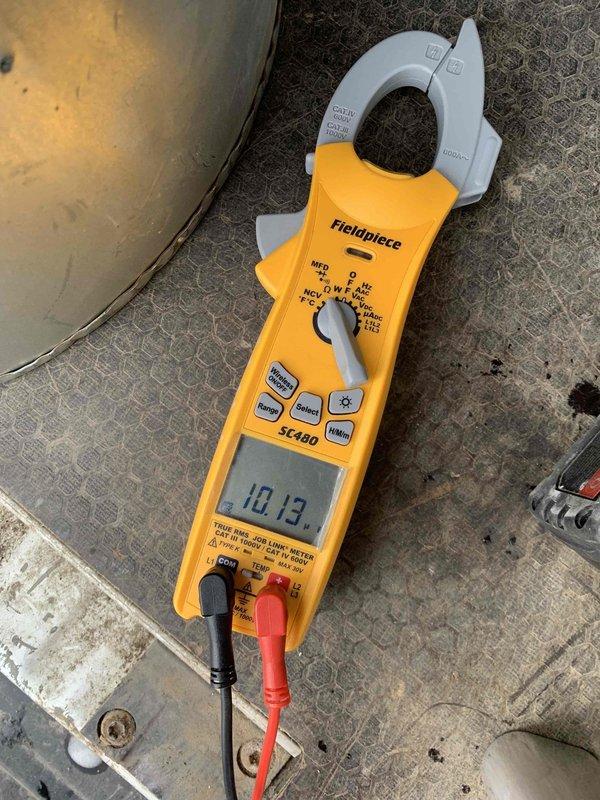 Returned to complete sold repair work on HVAC system. Performed electrical diagnostics using clamp meter to verify proper amperage readings and system operation. Connected and terminated multiple control wiring circuits at terminal block, including spare circuits, EAC, and ISM control wiring to ensure proper system functionality and communication between components.