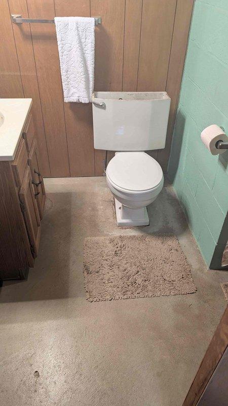 Responded to multiple plumbing issues including a leaking kitchen sink and garbage disposal connection, a running toilet in the basement with base leakage, and a faulty shut-off valve. Replaced the toilet flange and wax ring to address the base leak, installed a new shut-off valve, and repaired the kitchen sink drain connections to eliminate water seepage.
