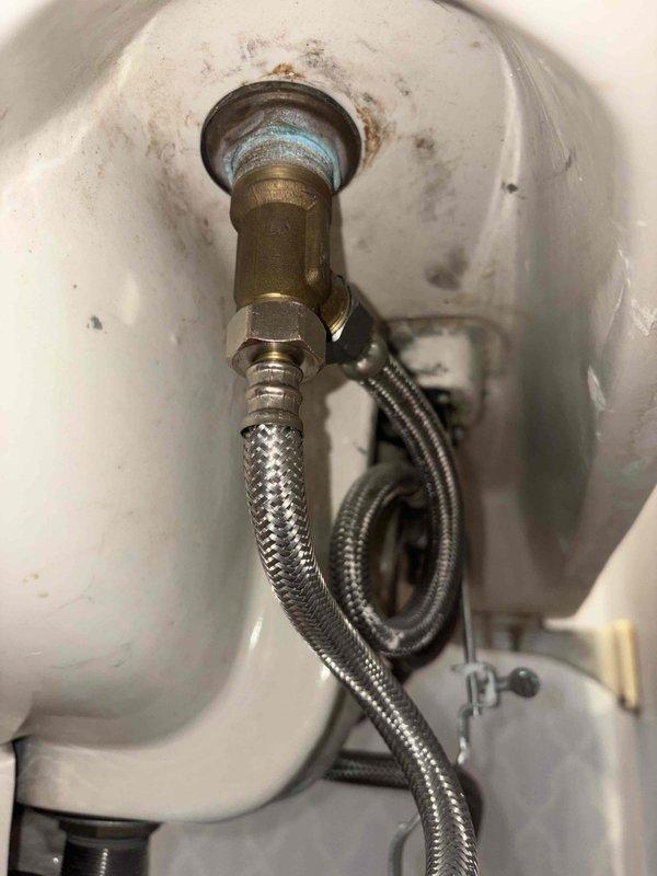 Returned to property to complete follow-up service on previously replaced faucet cartridges. Tightened cartridges on both toilet fill valve connection and bathroom sink faucet assembly to ensure proper sealing and eliminate potential leaks. Verified secure connections on braided stainless steel supply line at toilet fixture and inspected brass valve fitting for proper torque. Adjusted and secured sink faucet valve stems and reassembled decorative caps and handles to restore full functionality. All connections tested and confirmed leak-free upon completion.