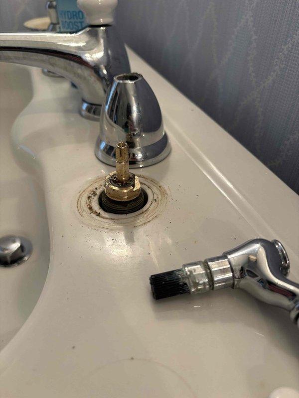 Returned to property to complete follow-up service on previously replaced faucet cartridges. Tightened cartridges on both toilet fill valve connection and bathroom sink faucet assembly to ensure proper sealing and eliminate potential leaks. Verified secure connections on braided stainless steel supply line at toilet fixture and inspected brass valve fitting for proper torque. Adjusted and secured sink faucet valve stems and reassembled decorative caps and handles to restore full functionality. All connections tested and confirmed leak-free upon completion.