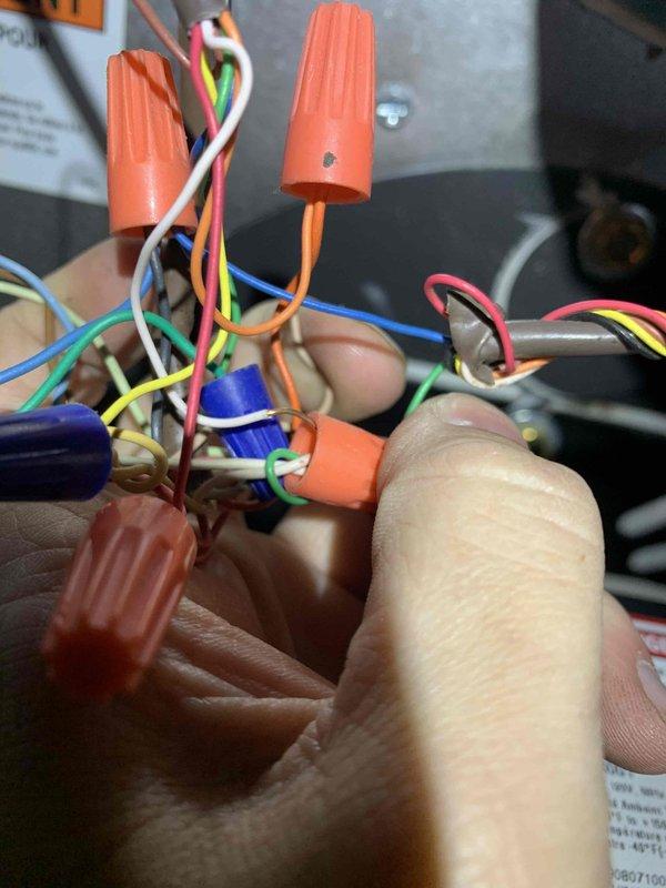 Responded to no heat call on oil furnace system less than 10 years old. Upon inspection, found faulty low-voltage control wiring connections causing intermittent thermostat signal loss. Stripped and re-terminated all control circuit wiring using proper wire connectors, ensuring secure connections between thermostat wires and furnace control board. Tested system operation and verified proper heating cycle initiation and flame ignition. Unit restored to full operational status.