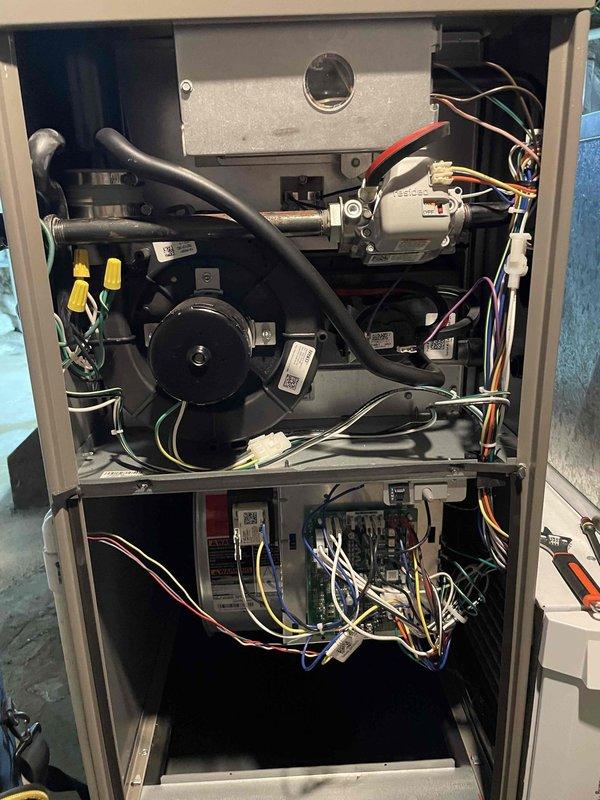 Completed heating maintenance club visit on air handler system. Performed comprehensive inspection of HVAC unit including temperature diagnostics using calibration probe, verified blower motor operation and capacitor condition, inspected electrical connections and wire terminations throughout system, and examined all internal components for proper operation. All systems found operating within normal parameters with no issues identified during routine maintenance inspection.