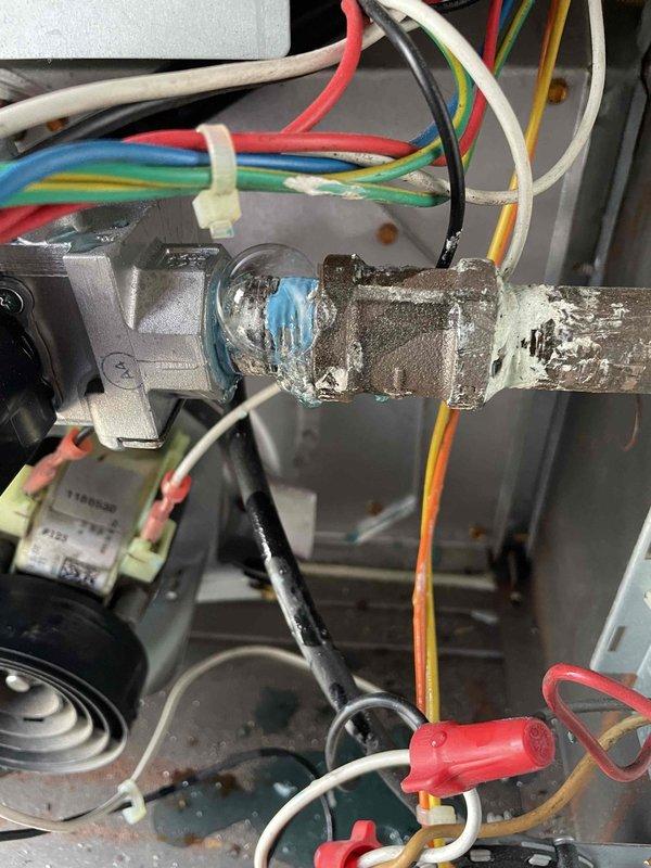 Responded to no heat call on 3-year-old furnace system. Upon arrival, discovered significant frost and ice accumulation on refrigerant lines and pipe fittings inside the unit, indicating abnormal operating conditions. Observed aged and corroded ductwork with rust spots throughout the plenum and galvanized steel components. Attempted to contact customer regarding service appointment but was unable to confirm booking. Left voicemail message for customer callback to schedule proper diagnostic service and repair of heating system malfunction.