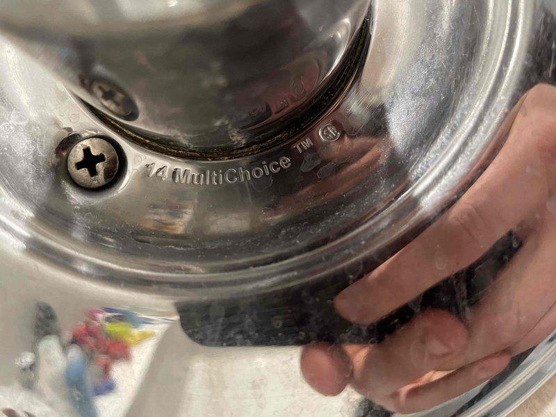 Responded to callback for persistent shower drip issue. Removed and inspected Delta Monitor MultiChoice valve cartridge and trim assembly. Found worn cartridge seals causing continued water seepage past shutoff mechanism. Replaced cartridge with OEM replacement part, reassembled valve body, and reinstalled chrome trim escutcheon. Tested hot and cold water operation through full range of motion, confirmed complete shutoff with no residual dripping. System operating properly at time of departure.