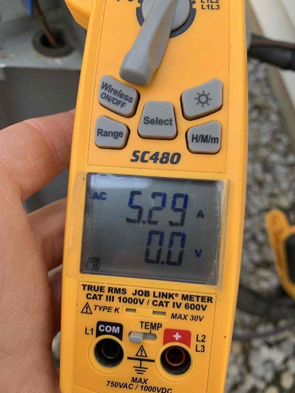 Completed routine cooling maintenance for club member. Inspected and tested electrical components, including dual-element time-delay fuses which showed signs of heat exposure and age-related patina. Measured system amperage at 52.9A using calibrated testing equipment to verify proper electrical operation and confirm unit is running within manufacturer specifications.