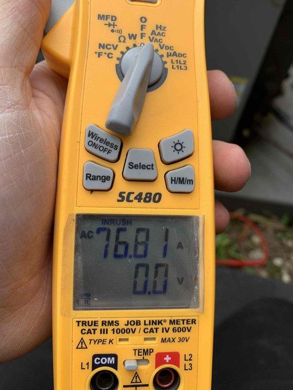 Completed HVAC club membership renewal maintenance visit for air handler unit. Performed system inspection and electrical diagnostics, measuring inrush amperage at 76.81A using calibrated multimeter to verify compressor starting characteristics. Inspected dual-run capacitor rated at 40+5μF, confirmed proper mounting and electrical connections with all wire terminations secure.
