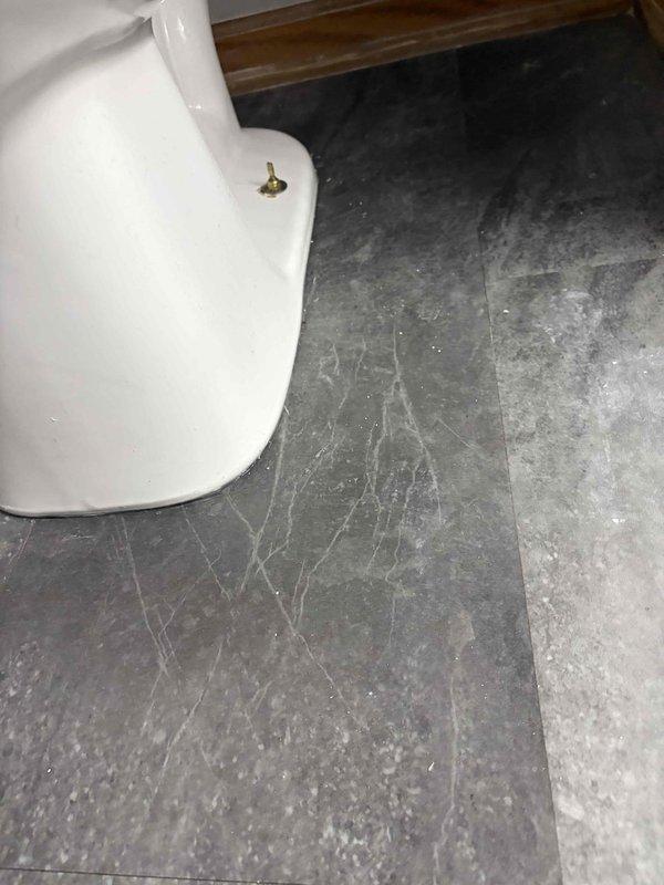 Completed return visit for urinal repipe installation in commercial restroom facility. Assessed existing plumbing configuration and verified proper installation of new water supply lines and drainage connections for wall-mounted urinal fixture. Inspected surrounding bathroom fixtures including toilet, sink, and exposed plumbing to ensure no interference with repipe work and confirmed all connections are secure and leak-free.