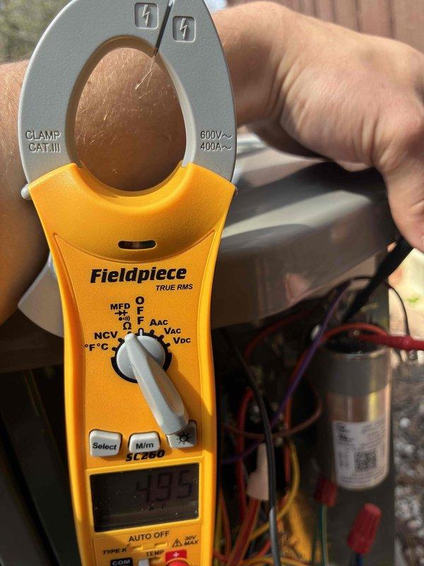 Completed cooling maintenance and seasonal startup for dual-zone HVAC system. Performed comprehensive system diagnostics using calibrated test equipment, measuring electrical parameters including voltage, amperage, and capacitance on outdoor condensing unit. Evaluated system pressures and temperatures using digital manifold gauges to verify proper refrigerant charge and operational efficiency. Inspected all electrical connections, capacitor integrity, and wiring at outdoor unit. System tested and confirmed operating within manufacturer specifications for the cooling season.