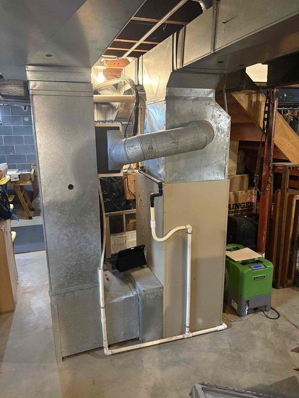 Responded to referral for HVAC equipment replacement after cracked heat exchanger was identified in existing system. Completed full assessment of basement mechanical room installation requirements and provided comprehensive estimate for new heating and cooling system replacement. Customer present throughout consultation to discuss equipment options and installation scope for complete system changeout.
