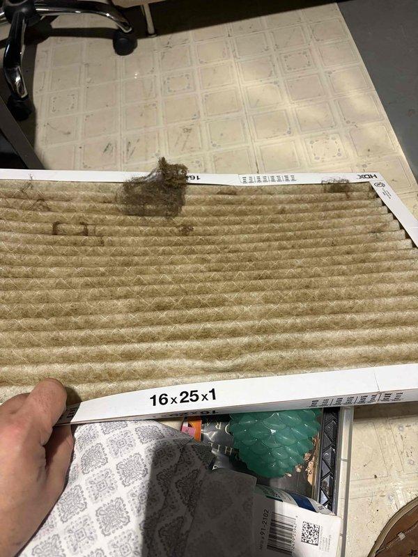 Responded to service call for inconsistent heating operation. Upon inspection, identified dirty flame sensor as cause of intermittent furnace cycling. Cleaned flame sensor to restore proper flame detection and reliable heating operation. Also noted heavily contaminated air filter with significant dust and debris accumulation, which was affecting system airflow and efficiency. This temporary repair restored heating function, though underlying conditions may require further attention to prevent recurrence.