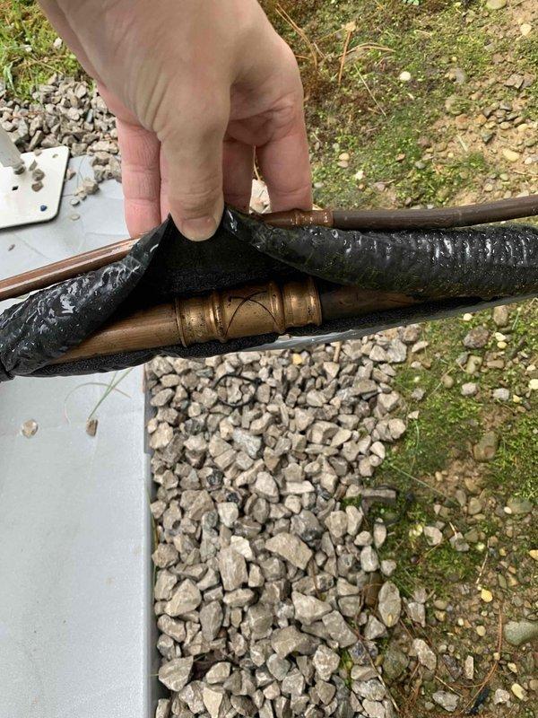 Responded to no heat call on system displaying yellow triangle error code. Upon arrival, inspected outdoor unit and refrigerant line connections, noting deteriorated insulation on copper refrigerant lines near foundation. Diagnosed faulty control board causing system lockout. Removed and replaced defective circuit board with new OEM component. Verified all electrical connections, tested system operation, and confirmed unit returned to normal heating mode with error code cleared. System restored to full functionality.