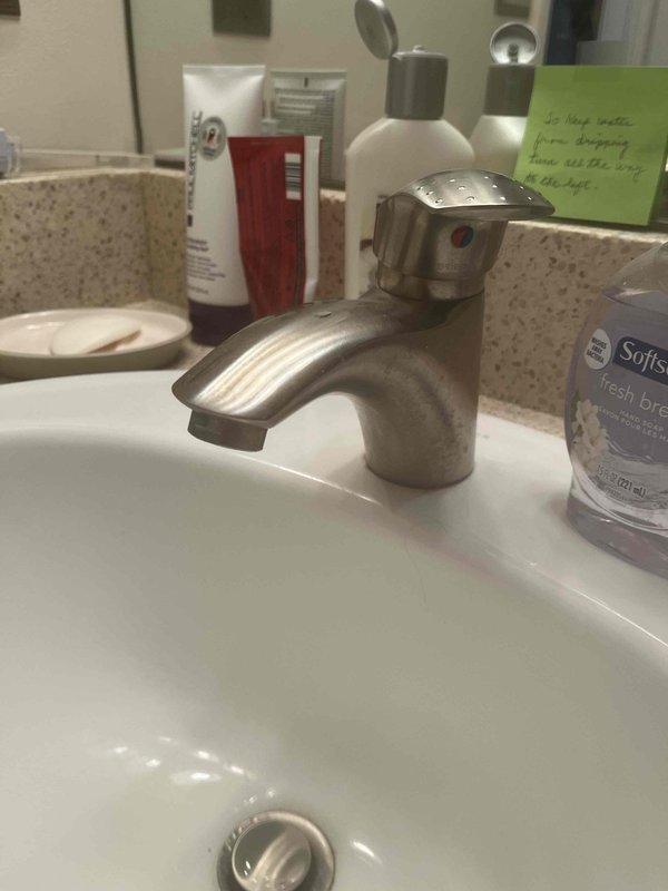 Responded to service call for multiple plumbing issues in residential property. Inspected toilet tank for reported slow leak, removed tank lid and examined fill valve assembly, flush valve mechanism, and flapper valve for proper operation and signs of deterioration. Assessed refill tube connection and overflow tube functionality. Evaluated second bathroom bathtub drain stopper mechanism that was not closing properly, identifying issue with drain assembly operation. Documented conditions of plumbing fixtures with photographs for service records.