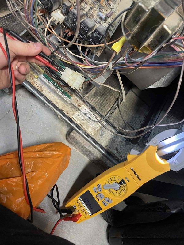 Responded to furnace failure caused by power surge. Upon inspection, found flame sensor damaged and control board affected by electrical surge. Performed diagnostic testing with multimeter to verify electrical issues and confirm system components were not receiving proper signals. Replaced faulty flame sensor and tested all electrical connections throughout the unit. Verified proper voltage readings, confirmed all wire connections were secure, and ensured control board functionality was restored. System tested successfully with furnace cycling properly and maintaining safe operation.