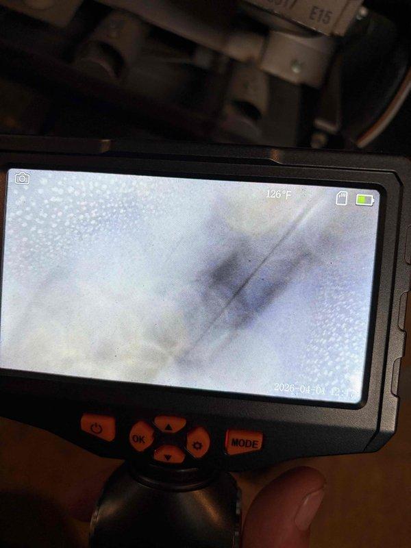 Performed comprehensive tune-up and inspection on American Standard forced air furnace system. Documented equipment specifications and utilized thermal imaging camera to verify system temperatures, recording 126°F during operational assessment. Customer inquired about maintenance club membership options.