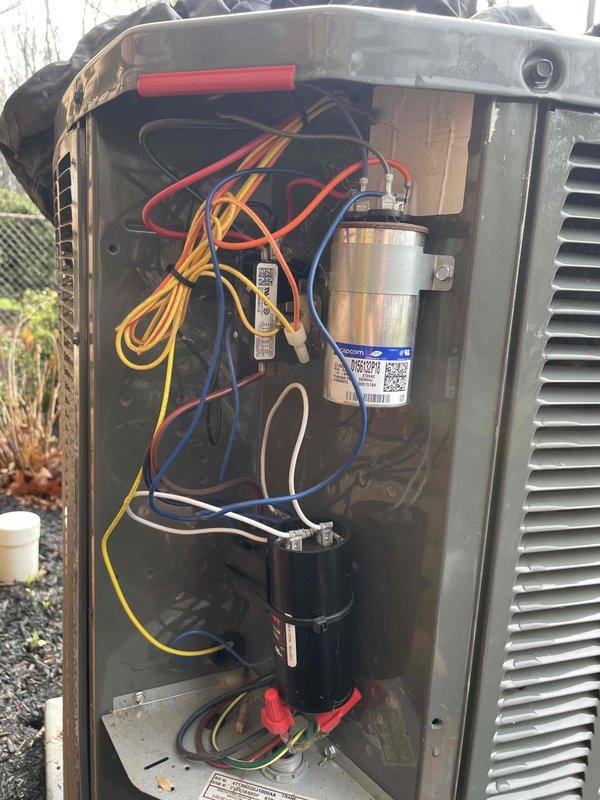 Completed routine cooling maintenance on attic air handler unit as part of club membership service. Upon inspection, discovered significant frost and ice accumulation on evaporator coils, indicating potential airflow restriction or refrigerant system issues. Inspected outdoor condensing unit electrical components including capacitors and wiring connections, documented equipment condition with photos for service records.