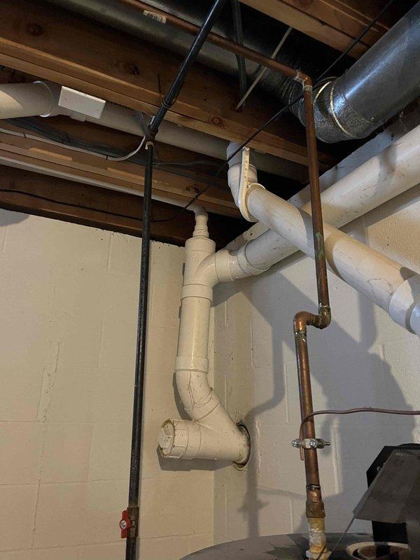 Responded to service call for non-operational sump pump system in residential basement. Upon inspection, diagnosed pump failure and completed necessary repairs to restore proper drainage functionality. Verified radon mitigation system integration with sump discharge piping was intact and all PVC connections were secure and properly vented to prevent future issues.