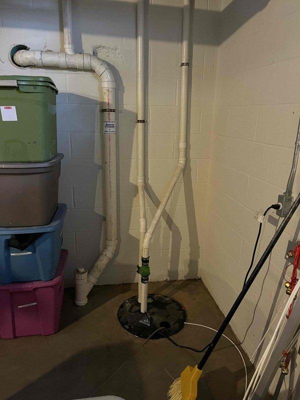 Responded to service call for non-operational sump pump system in residential basement. Upon inspection, diagnosed pump failure and completed necessary repairs to restore proper drainage functionality. Verified radon mitigation system integration with sump discharge piping was intact and all PVC connections were secure and properly vented to prevent future issues.