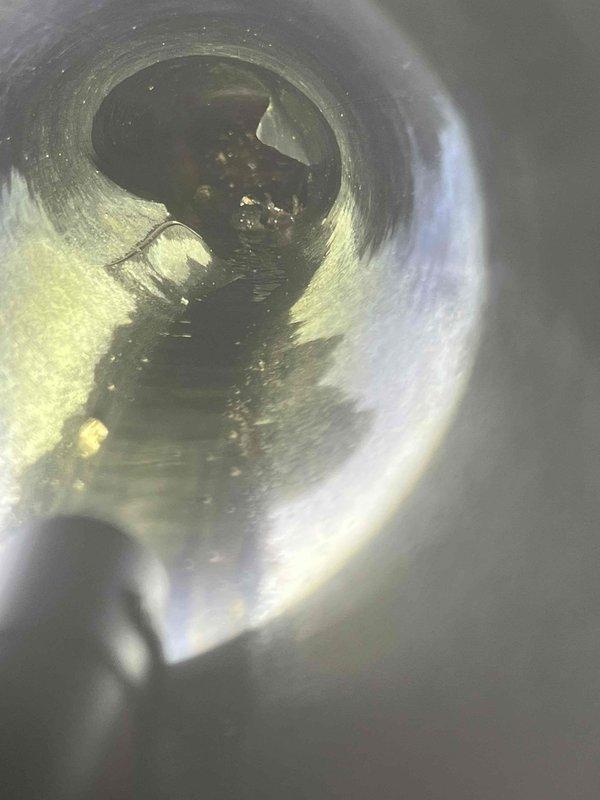 Responded to drainage backup issue occurring during heavy rainfall events. Performed thorough assessment of main drain system and identified standing water and debris accumulation in primary cleanout access point. Conducted camera inspection revealing sediment buildup and drainage restrictions within main line. Executed mechanical snaking of main drain to remove blockages and restore proper flow. Cleared additional exterior drainage points around property that had not been previously serviced. Recommended installation of sump pump system to prevent future water intrusion during storm events, as property currently lacks adequate water management infrastructure for handling large volume rainfall.