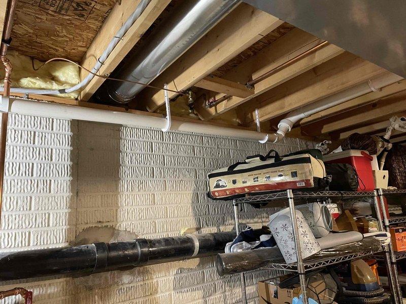 # Tankless Water Heater Installation

Successfully installed a Navien tankless water heater unit in the basement utility area. The installation included proper venting, gas line connection, and water supply integration with existing plumbing infrastructure. All electrical connections were completed to manufacturer specifications, and the unit was mounted securely to the foundation wall. System was tested for proper operation, including flow rate verification and temperature settings. The installation area was left clean and organized with all components functioning as designed.