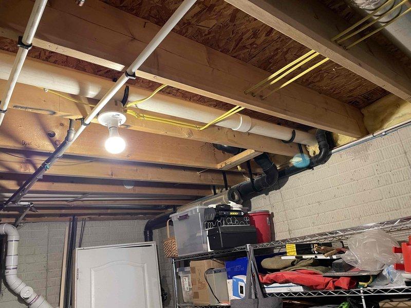 # Tankless Water Heater Installation

Successfully installed a Navien tankless water heater unit in the basement utility area. The installation included proper venting, gas line connection, and water supply integration with existing plumbing infrastructure. All electrical connections were completed to manufacturer specifications, and the unit was mounted securely to the foundation wall. System was tested for proper operation, including flow rate verification and temperature settings. The installation area was left clean and organized with all components functioning as designed.