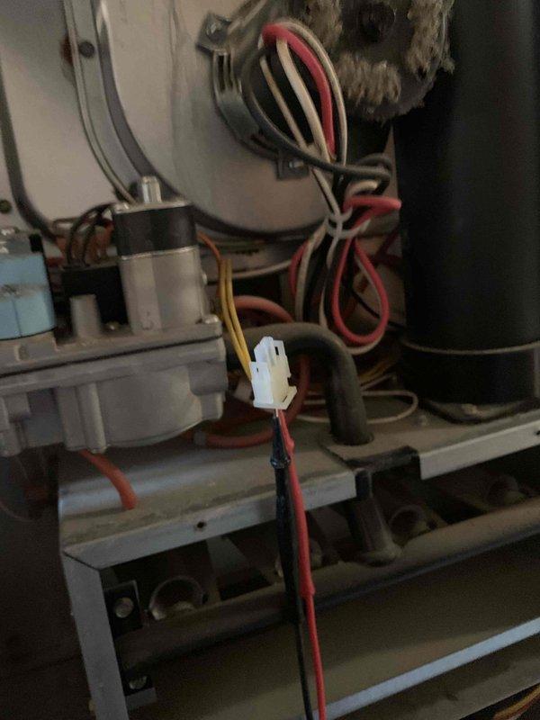 Responded to emergency no-heat call on furnace system. Upon arrival, performed comprehensive diagnostic testing using Fluke multimeter to assess electrical components and system functionality. Inspected blower motor assembly, internal wiring connections, and control board circuitry. Evaluated motor capacitor, transformer output, and verified proper voltage supply throughout the unit. Checked all wire terminations and electrical connectors for secure connections and signs of failure. Measured temperature differentials and assessed overall system operation to identify root cause of heating failure.