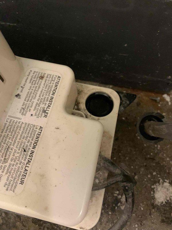Responded to emergency no-heat call for 3-year-old furnace system. Upon inspection, discovered condensate pump failure preventing furnace operation due to safety switch activation. The pump had experienced overflow conditions, evidenced by significant water staining and moisture accumulation on concrete floor surrounding unit. Cleared condensate line blockage, tested pump operation, and verified proper drainage function. Reset safety switch, restored furnace to normal heating operation, and confirmed system cycling properly before departure.