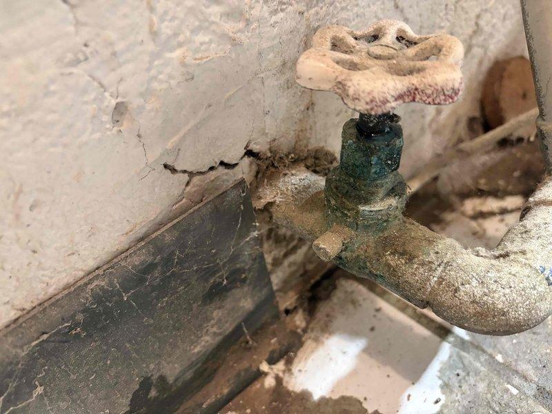 Responded to callback for leaking boiler installed previous week. Upon arrival, inspected all water connections and fittings on newly installed unit. Located source of leak at brass compression fitting on copper supply line. Fitting had loosened due to thermal expansion during initial system operation. Tightened compression nut to proper torque specification using appropriate wrench. Pressurized system and monitored all connections for 15 minutes with no further leakage detected. Verified proper boiler operation and left system running normally.
