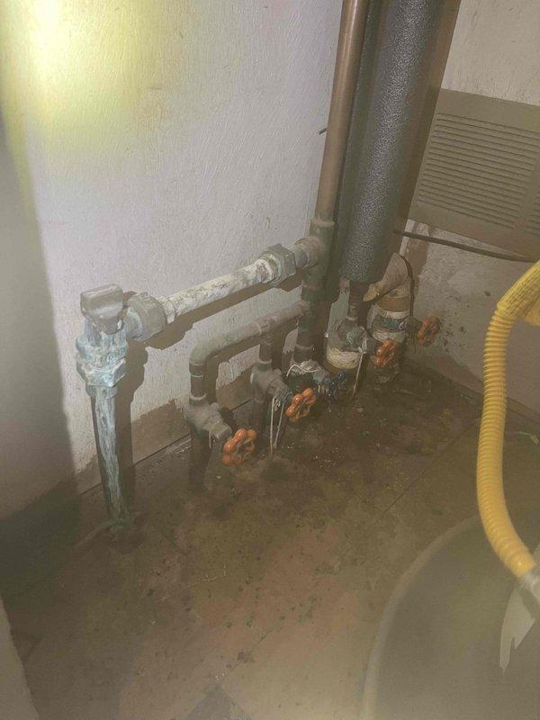 Responded to no-water emergency at residential property. Coordinated with municipal water utility to shut off water supply at street-level curb stop. Replaced failed valves on main water supply line from street to building. Installed three new ball valves with orange handles on copper piping configuration in basement utility area to provide proper isolation and flow control for water distribution system. All connections pressure-tested and verified for proper operation before restoring water service to property.