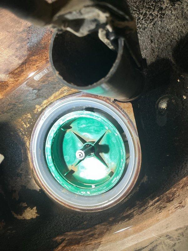 Replaced failed American Standard 4215A flush valve assembly on toilet after previous rebuild from July catastrophically failed. Removed deteriorated valve components showing severe corrosion and wear, installed new factory replacement valve with fresh gaskets and seals. Tested flush mechanism for proper operation and verified no leaks at tank-to-bowl connection. Toilet restored to full working condition.